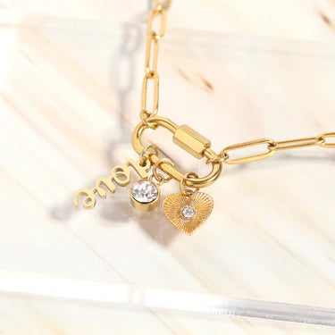Golden Love Charm Necklace – 18K Gold Paperclip Chain with Heart, Crystal & Love Charms