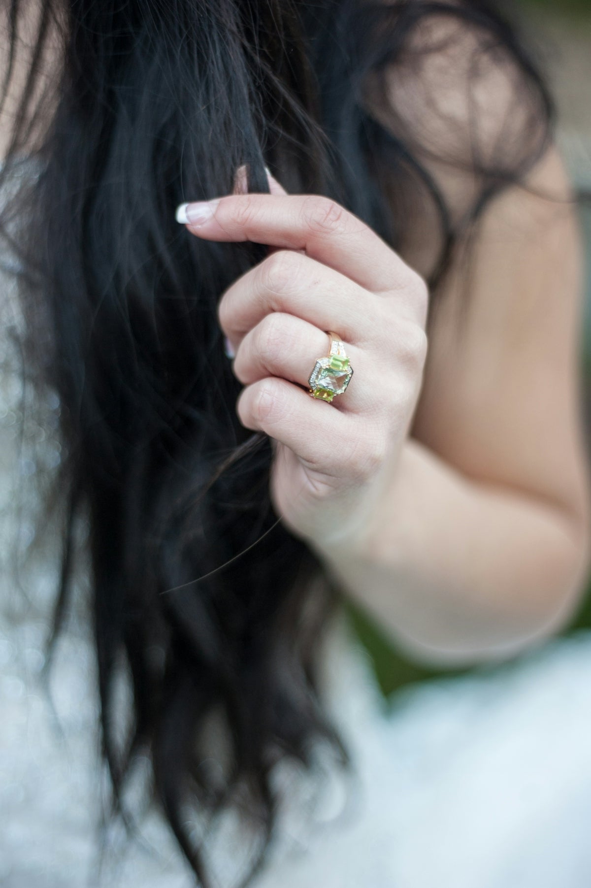 Woman's hand with a large engagement ring