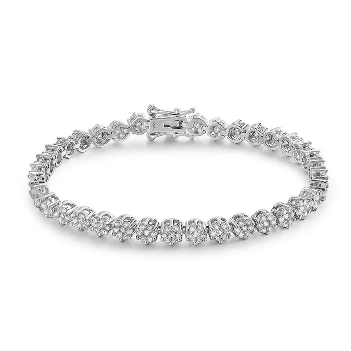 Moissanite jewelry collection featuring sparkling rings, necklaces, earrings, and bracelets