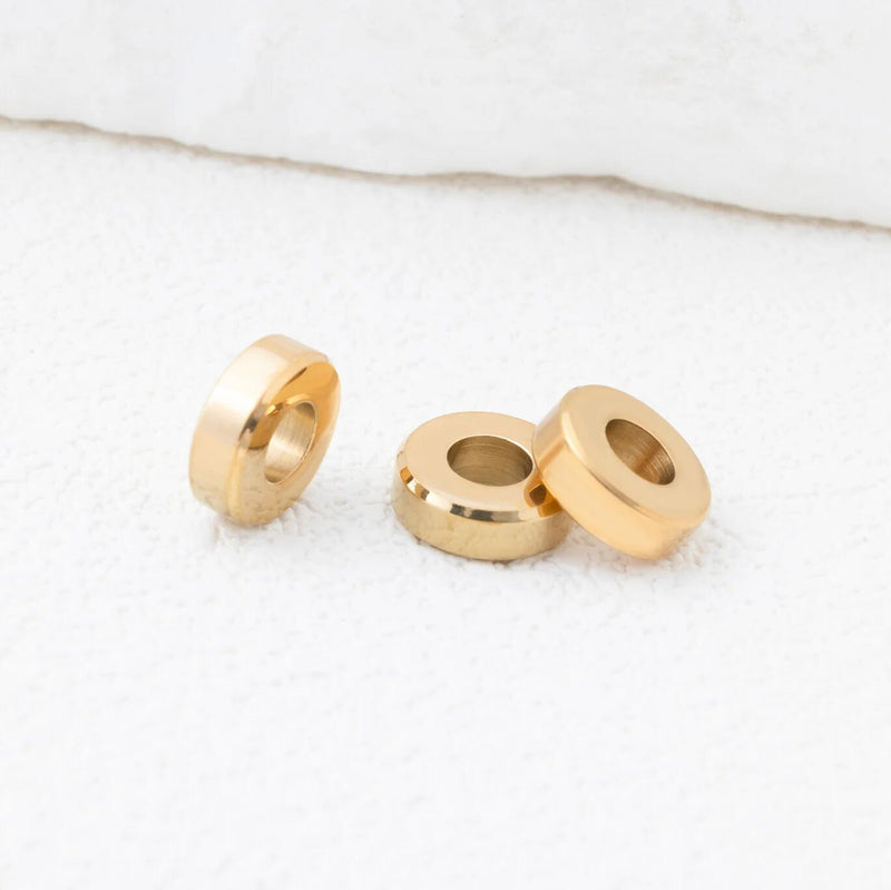 Jewelry making supplies including chains, charms, findings, and stainless steel components