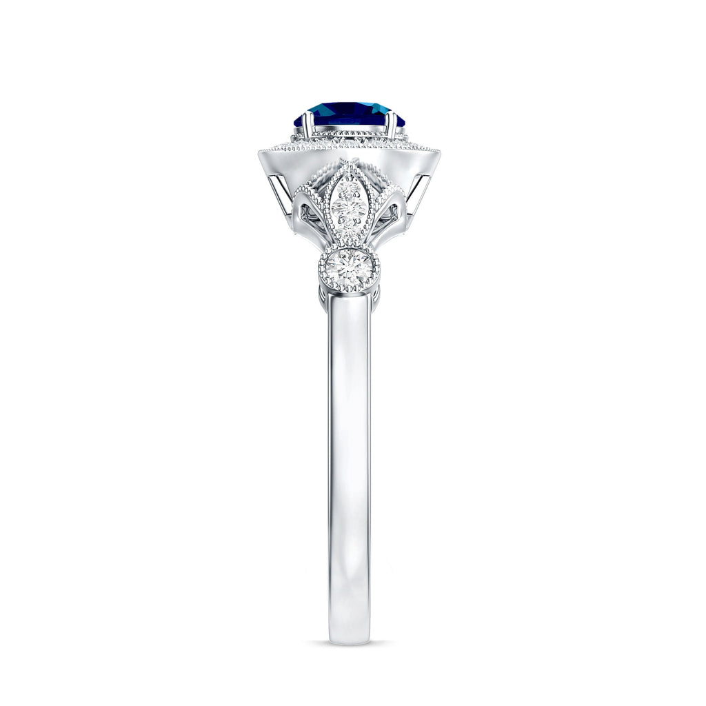 0.6 Carat London Blue Topaz Antique Engagement Ring with Diamond Halo