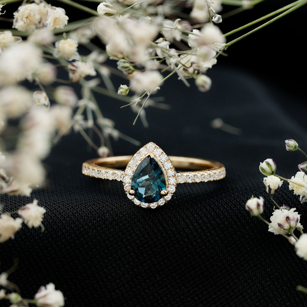 0.7 Carat Pear Shape London Blue Topaz Teardrop Engagement Ring with Moissanite Halo