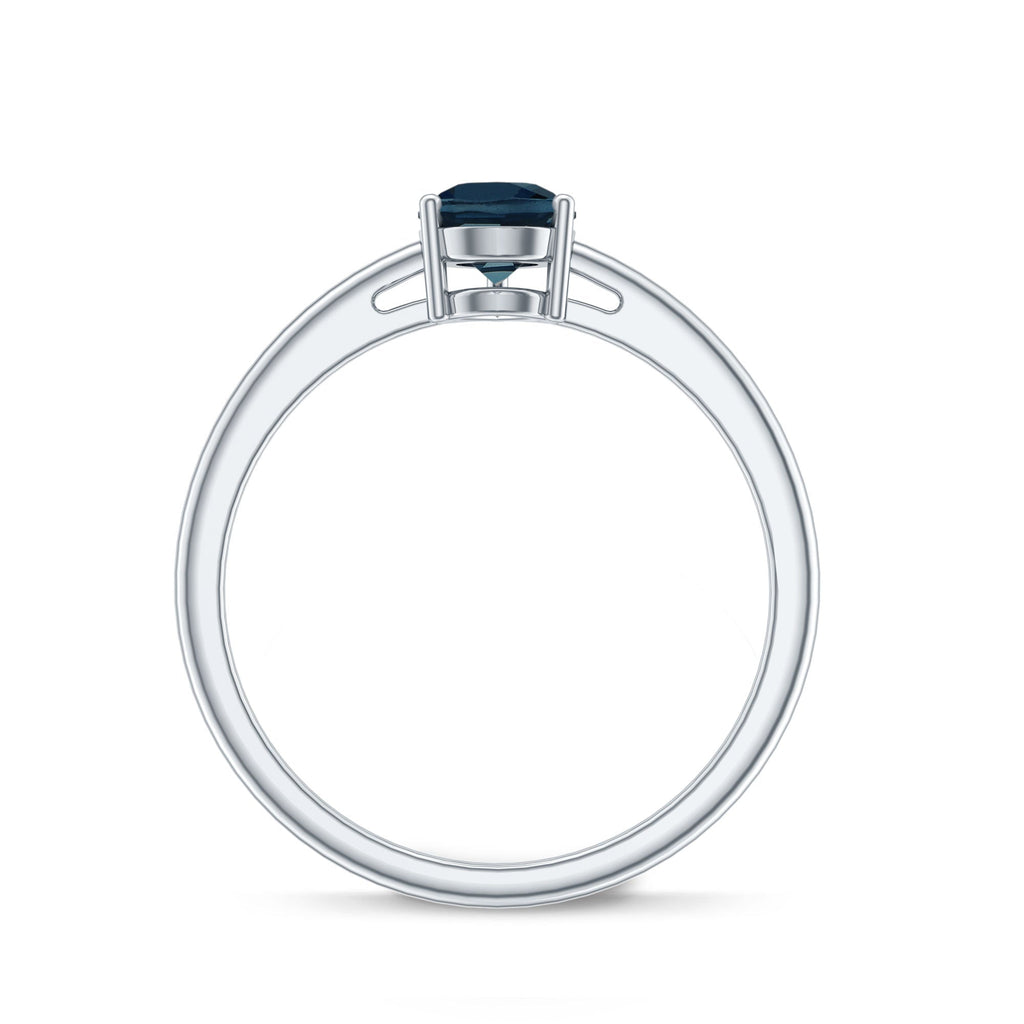 0.7 Carat Pear Shaped London Blue Topaz Solitaire Ring