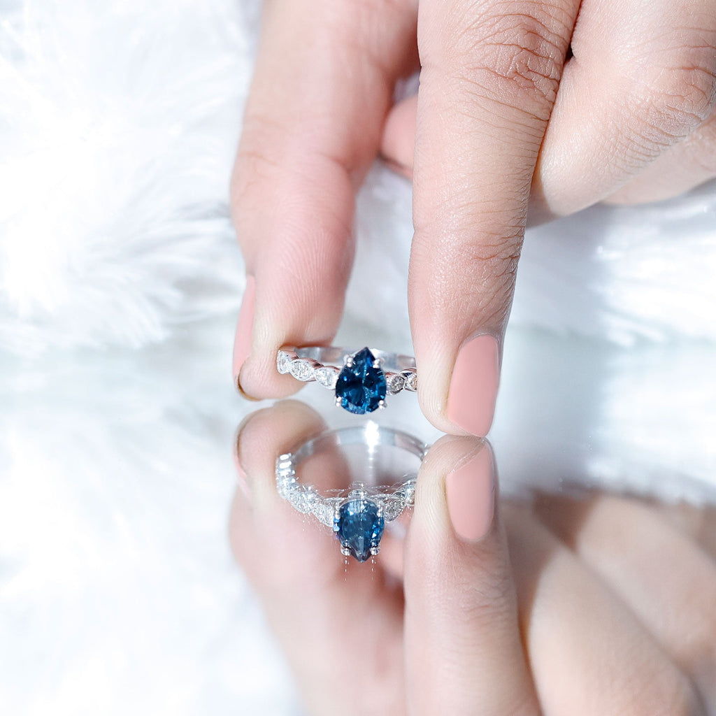 1 Carat Pear Shaped London Blue Topaz Teardrop Engagement Ring with Diamond