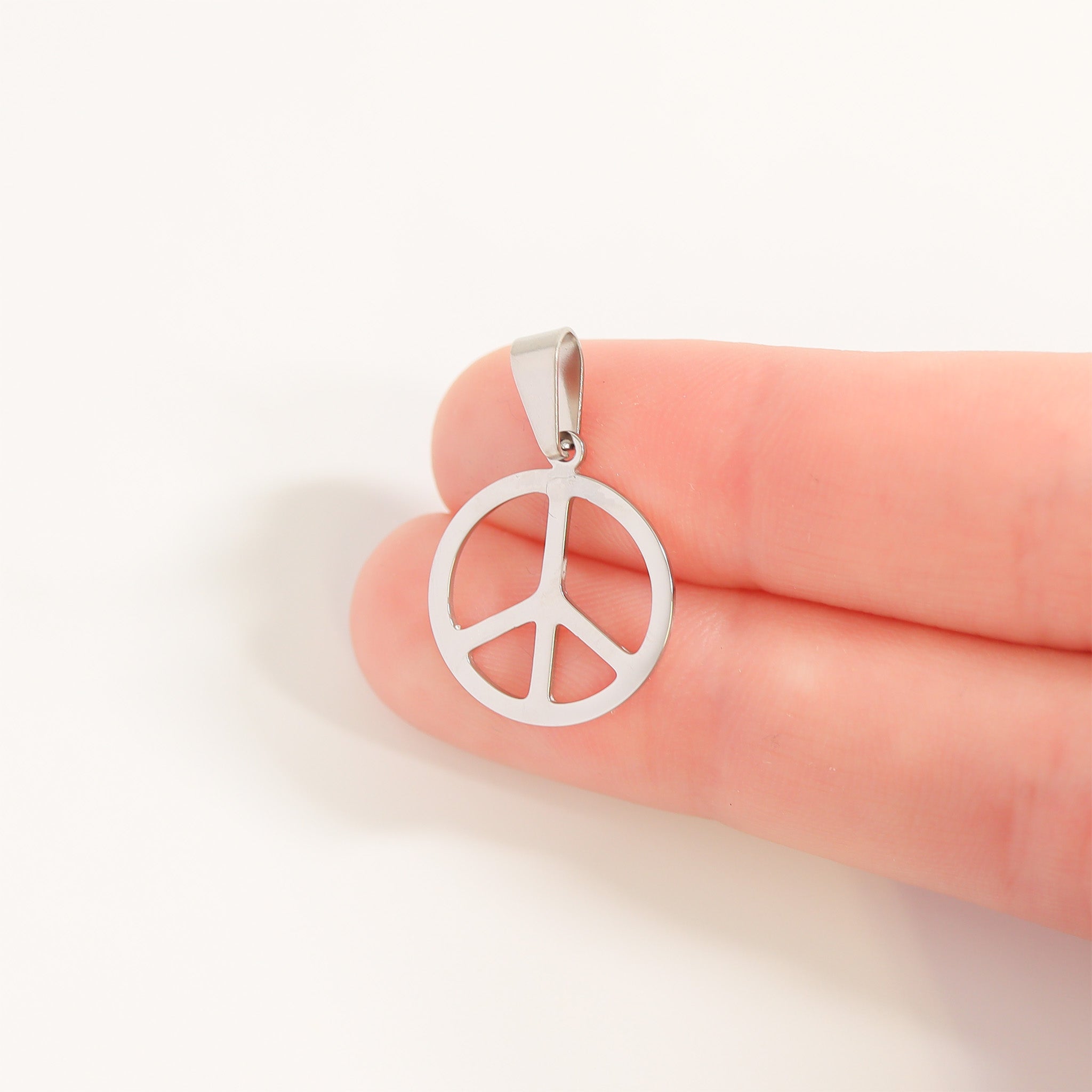 Peace sign pendant scale