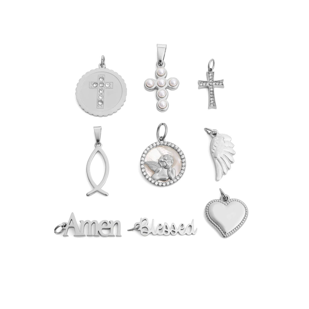 Collection of various silver pendants on a white background