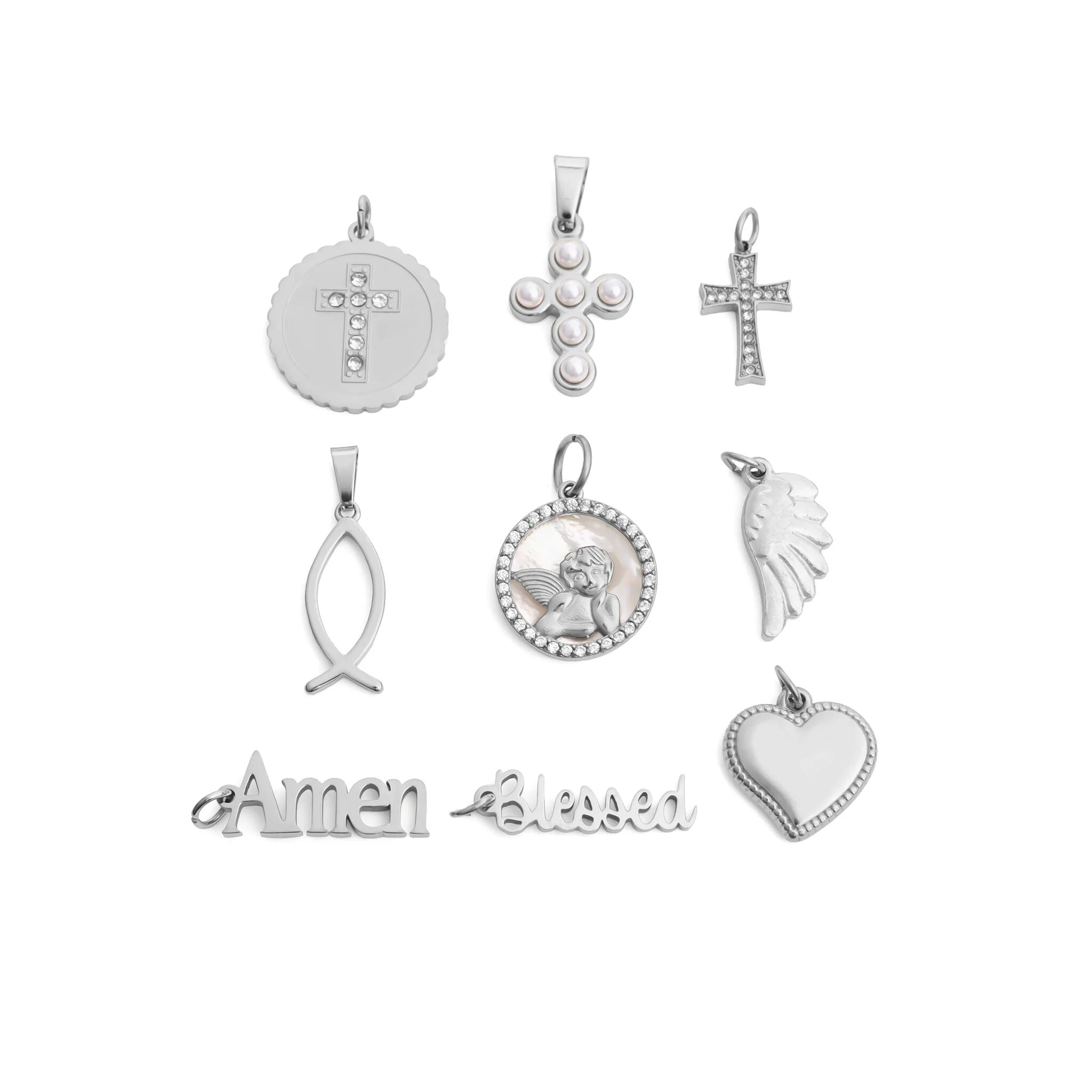 Collection of various silver pendants on a white background