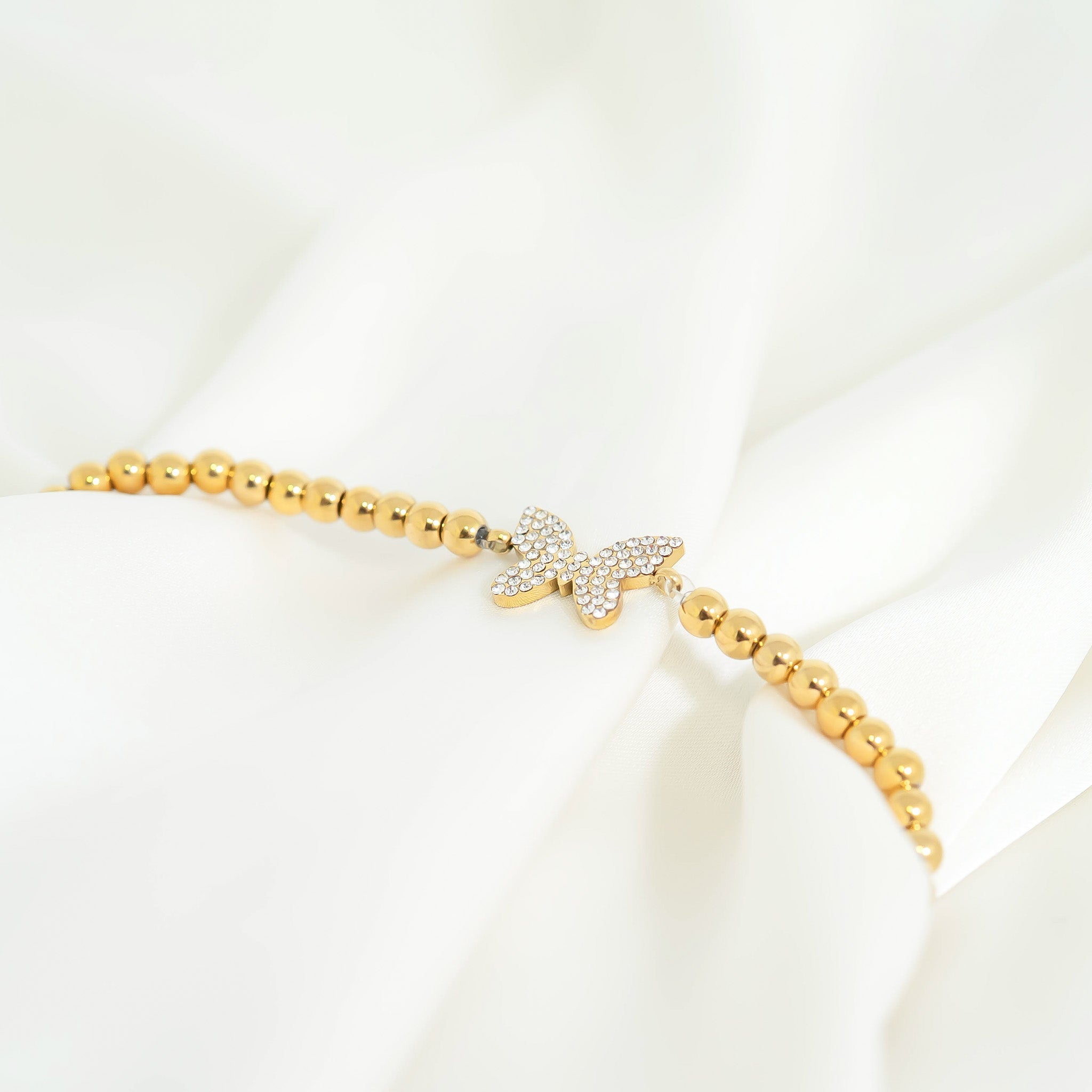 Gold Beaded Bracelet – Adjustable Stretch With Butterfly Charm | Stainless Steel Jewelry