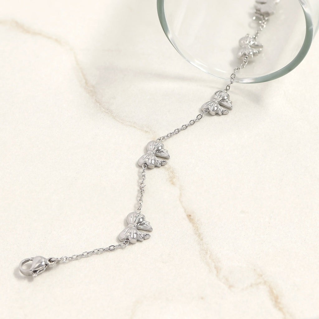 Gold Bow Bracelet – Adjustable Stainless Steel Chain | Polished Gold Tone Jewelry