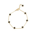Gold Small Floral Motif Bracelet with black flower-shaped charms on a white background