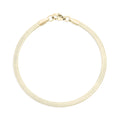 Gold bracelet on a white background