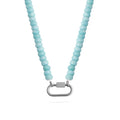Light blue beaded necklace with a silver clasp on a white background