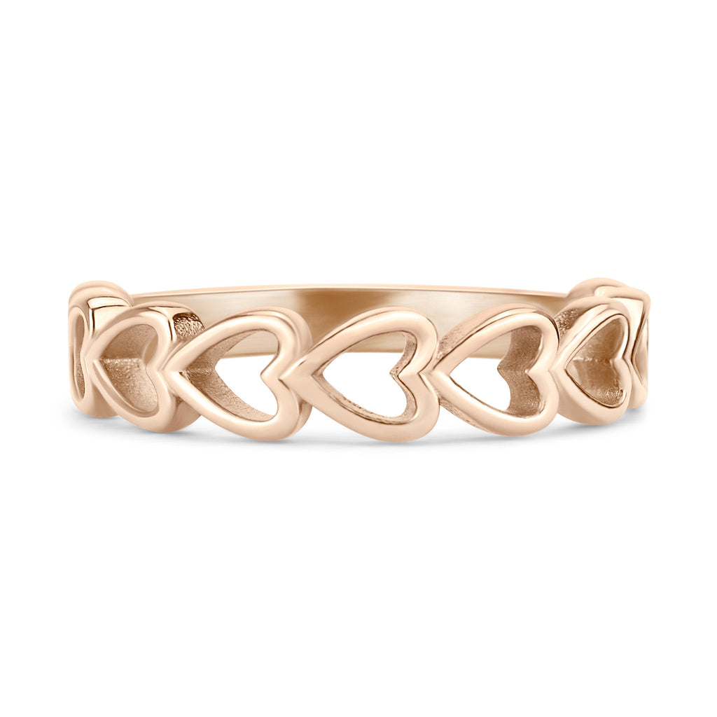A gold ring with a row of heart-shaped cutouts arranged in a circular pattern.