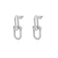 Pair of silver hoop earrings with small beads on a white background