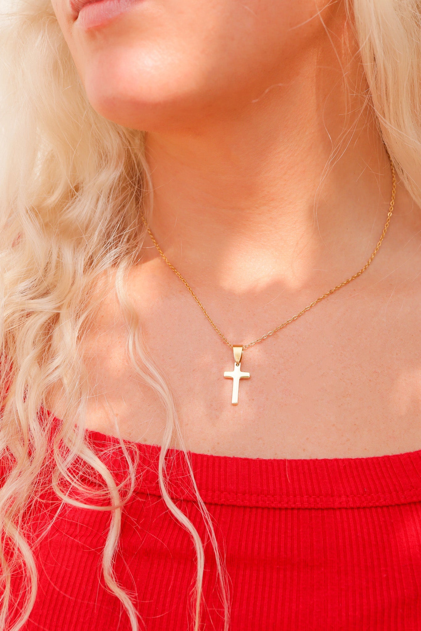 Chain necklace with Christian cross hanging pendant Lifestyle