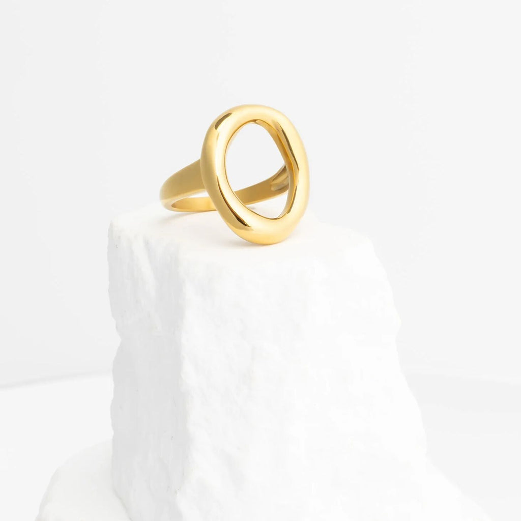 Gold Oval Motif Ring  on a white background