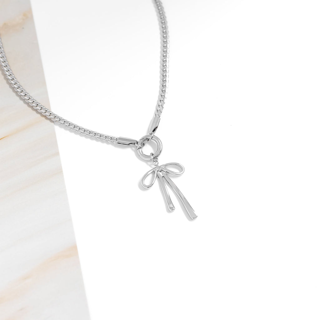 Gold Bow Charm – 18K Gold PVD Stainless Steel Long Bow Pendant | Hypoallergenic Jewelry