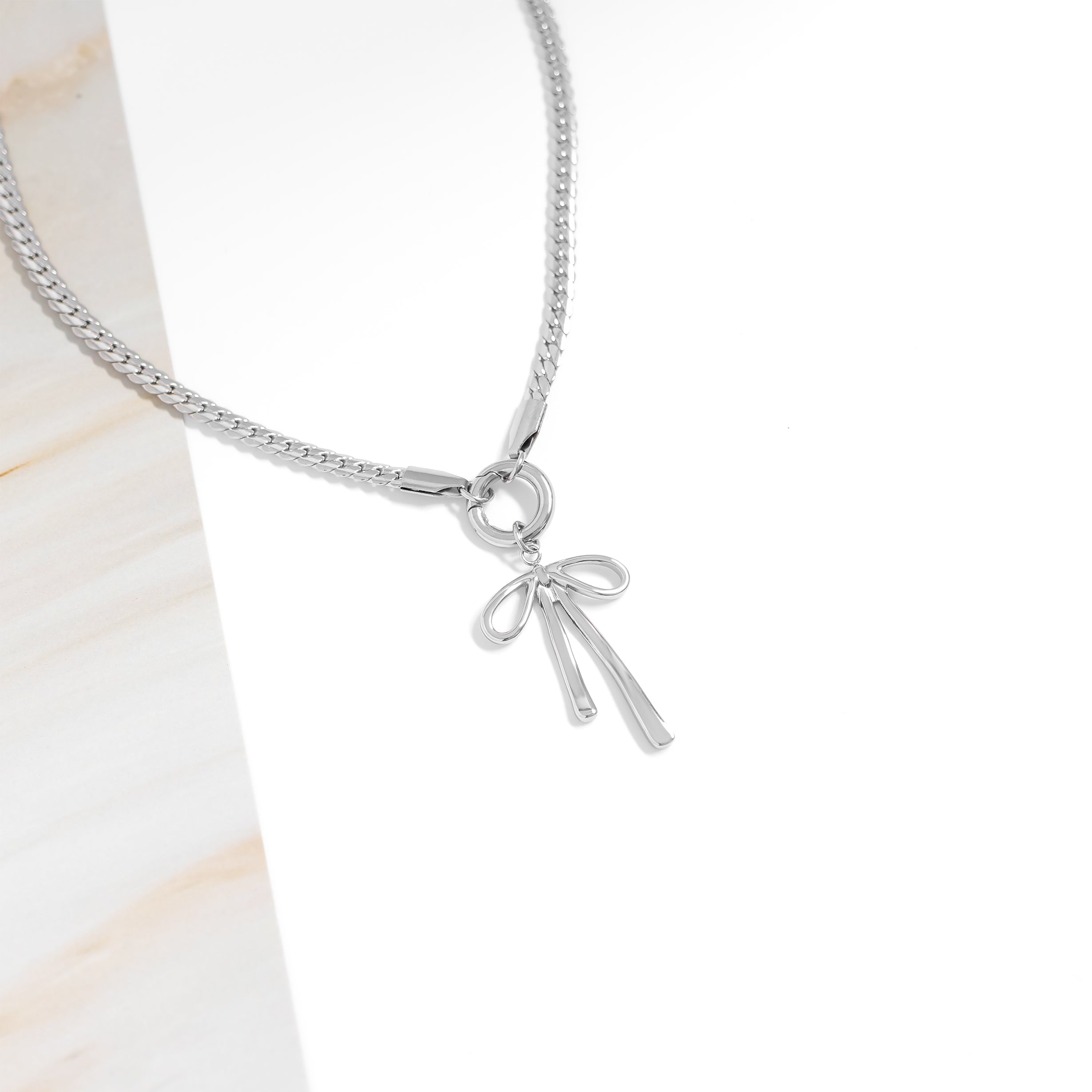 Gold Bow Charm – 18K Gold PVD Stainless Steel Long Bow Pendant | Hypoallergenic Jewelry