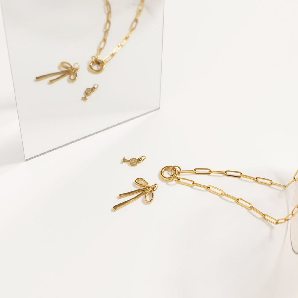 Gold Bow Charm – 18K Gold PVD Stainless Steel Long Bow Pendant | Hypoallergenic Jewelry