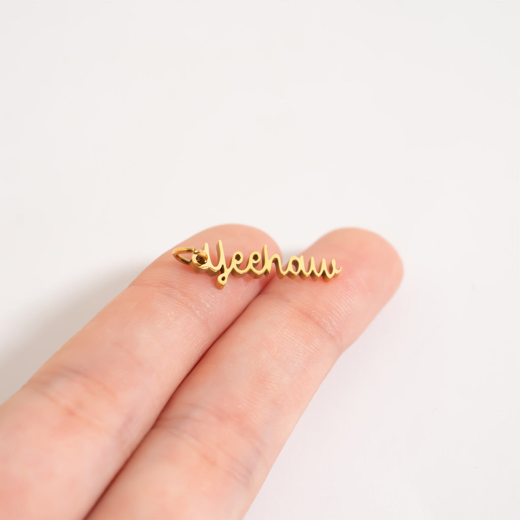 Yeehaw Charm – Gold & Stainless Steel Western Jewelry Pendant, Playful Design