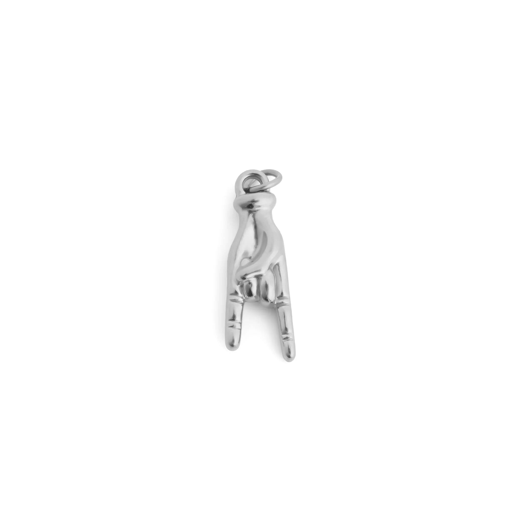 Silver charm shaped like a person in a dynamic pose on a white background