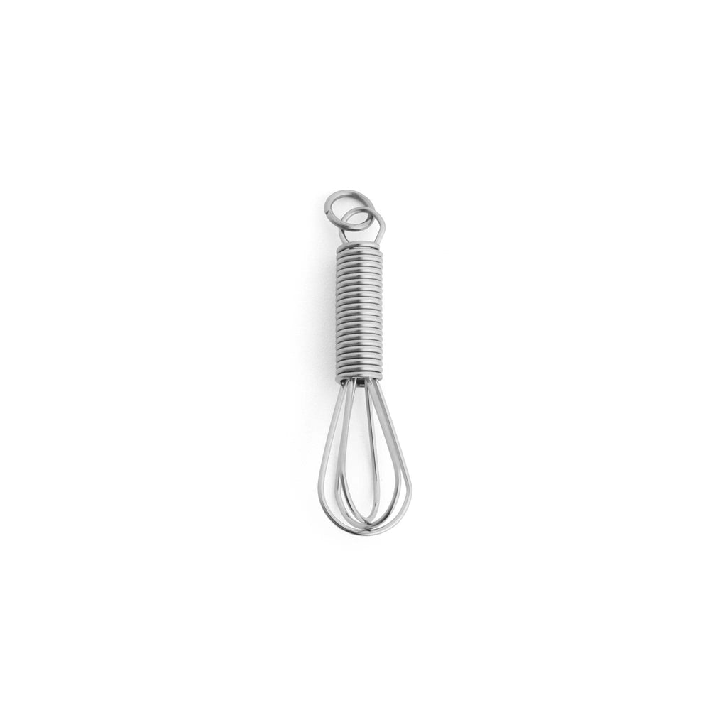 Metallic whisk on a white background