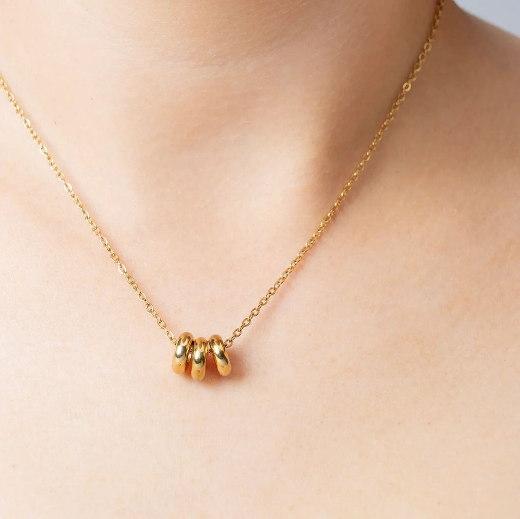 Gold Rounded Spacer Beads on loop/cable chain