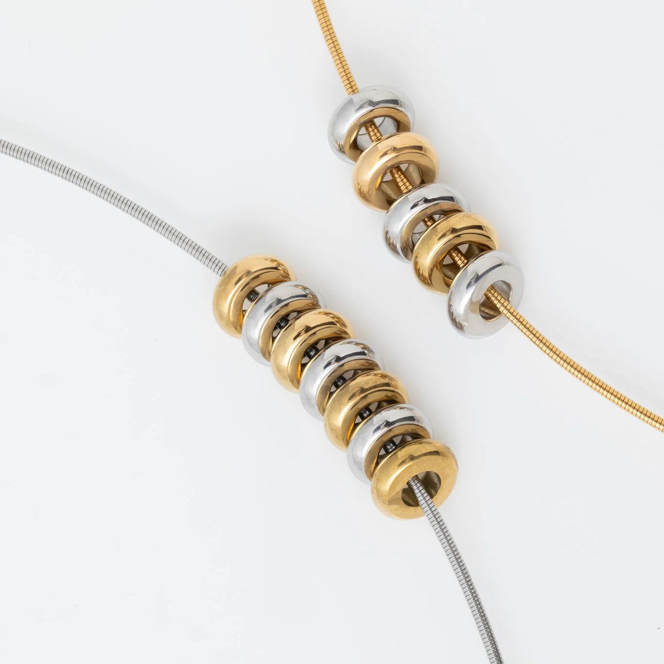 Gold and Silver Rounded Spacer Beads on gold and silver collar necklace 
