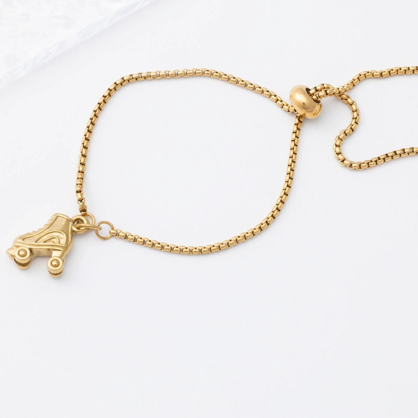 18K Gold PVD Stainless Steel Roller Skate Charm- gold studio 