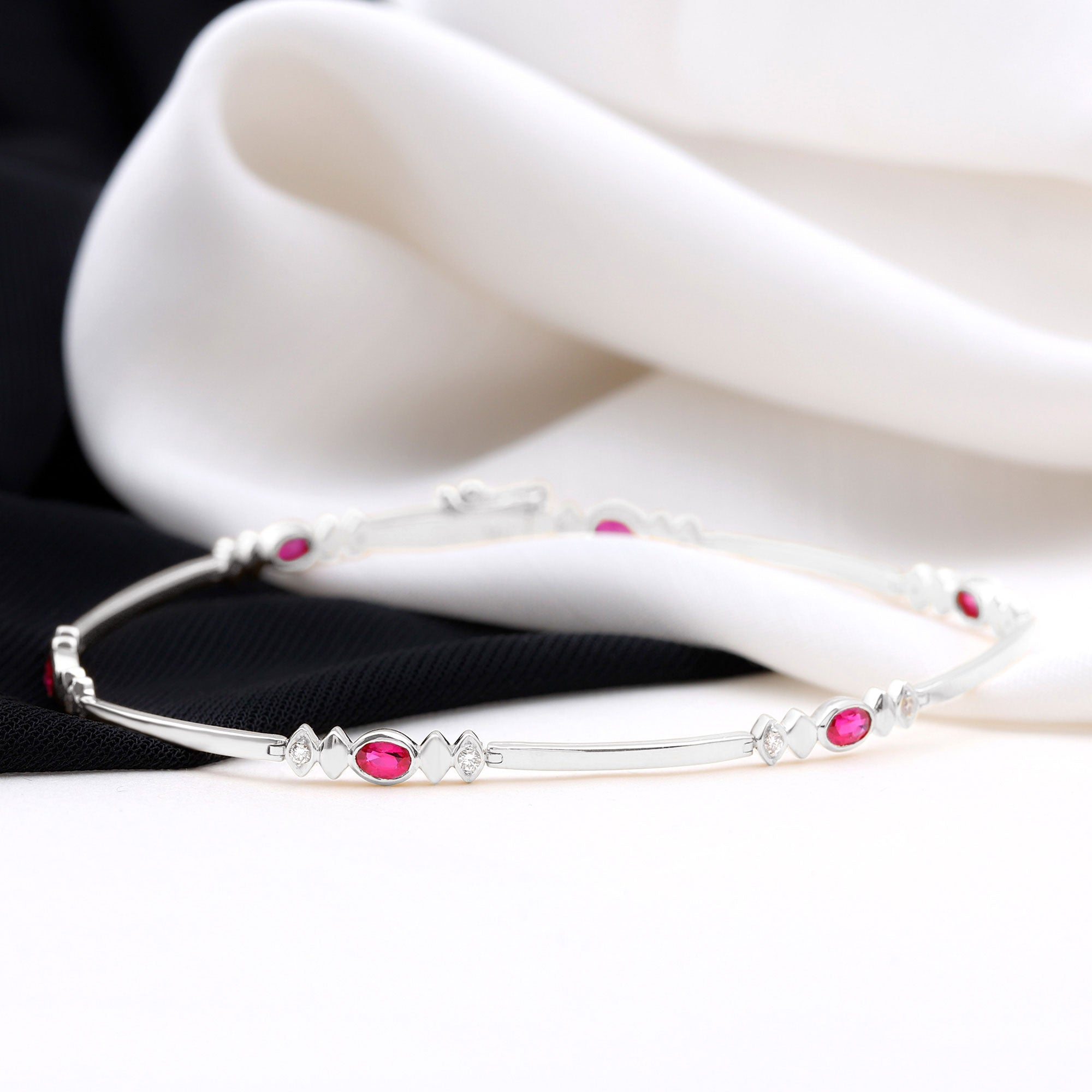 Lab Grown Ruby Bracelet – Oval Ruby & Diamond Link Tennis With Box Clasp
