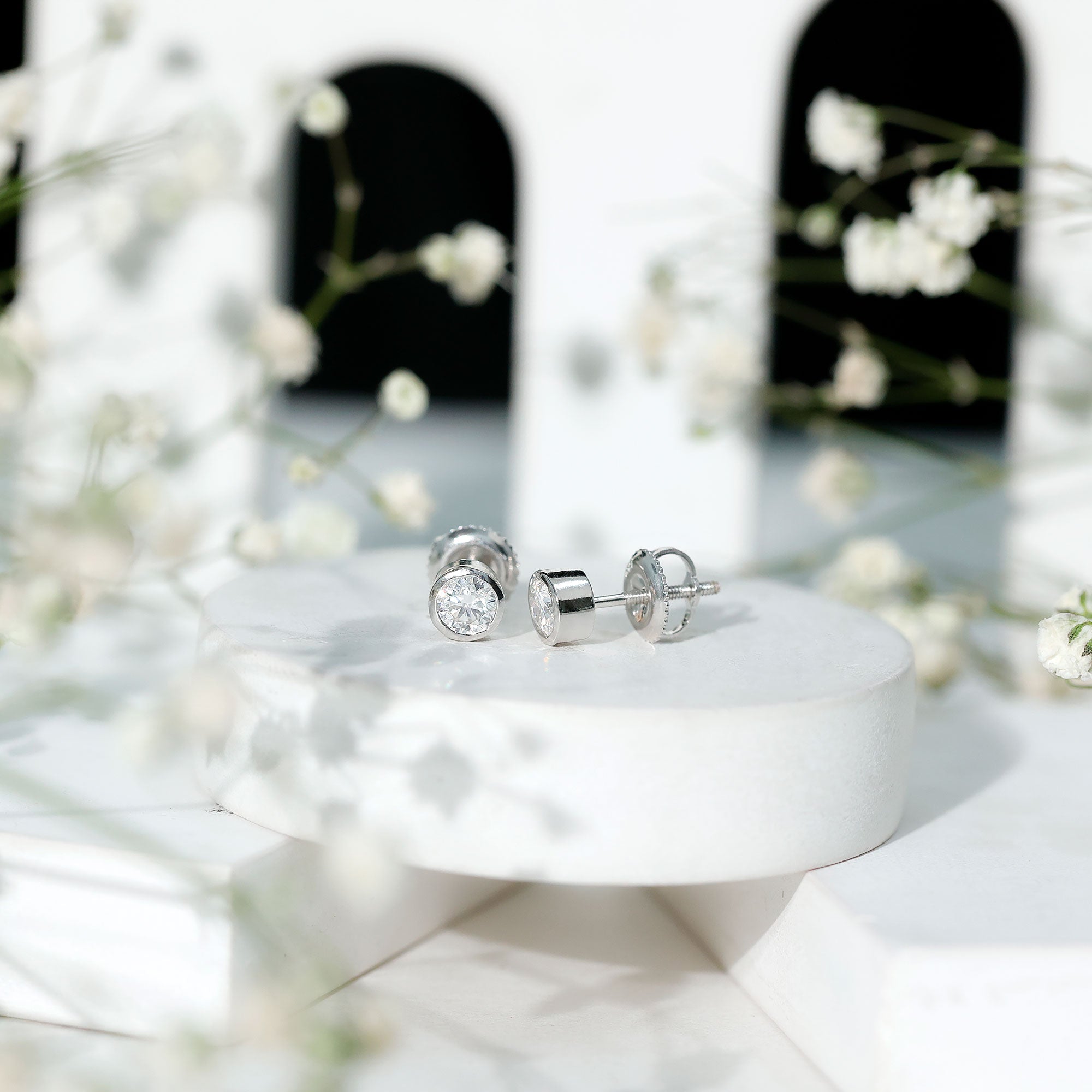 Moissanite Stud Earrings - 0.6 Carat D-VS1 Quality Round Bezel Setting | 14k White Gold