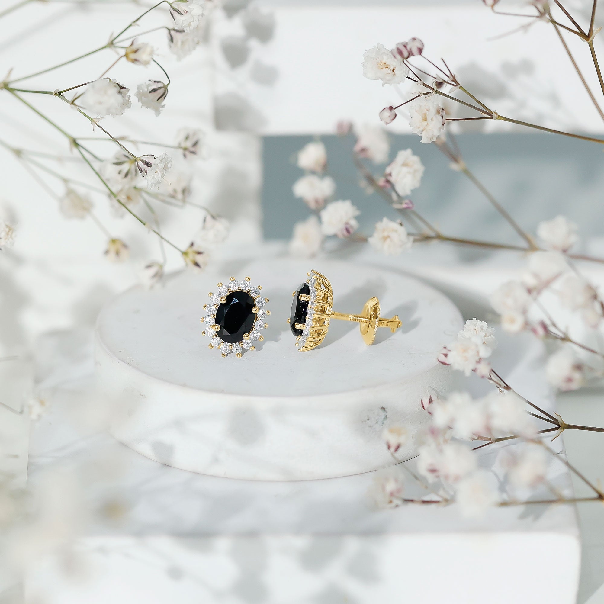 2 Carat Oval Shaped Black and White Diamond Stud Earrings in Yellow Gold Plated Silver