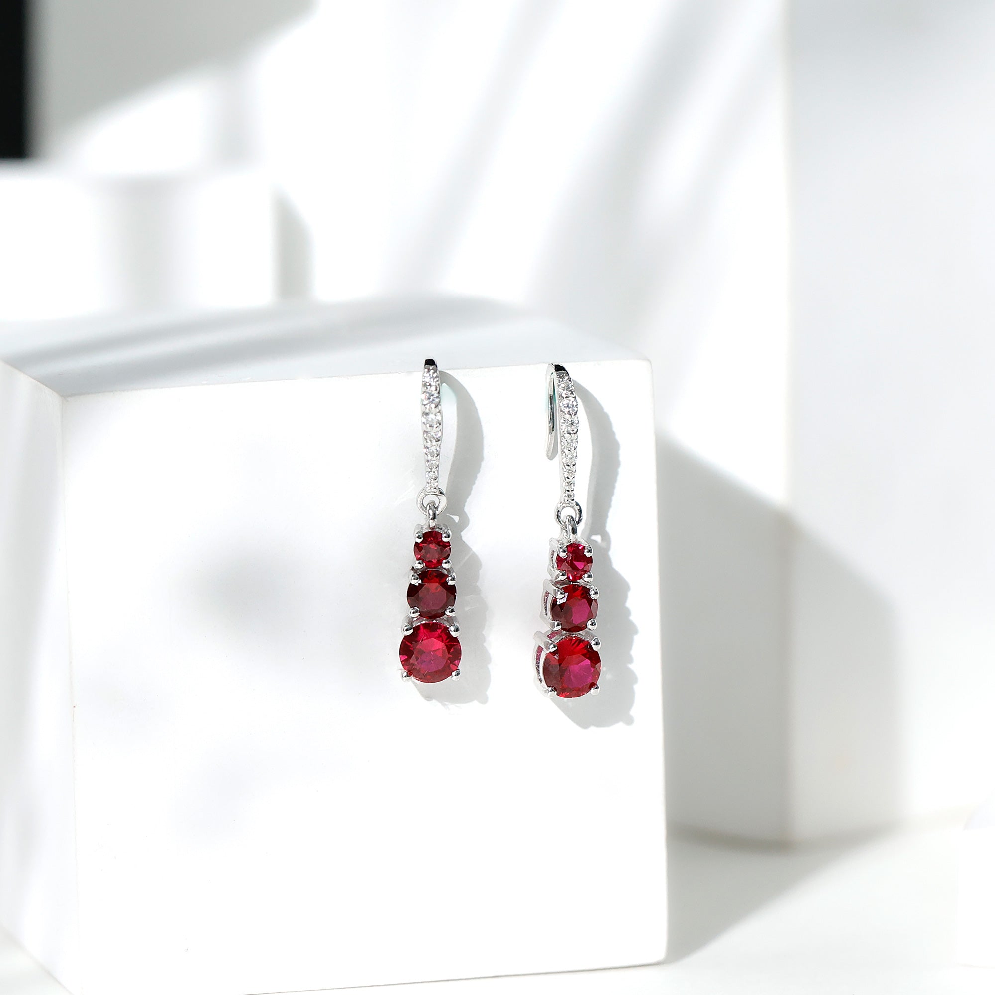Certified Lab Created Ruby Three Stone Dangle Earrings with Moissanite