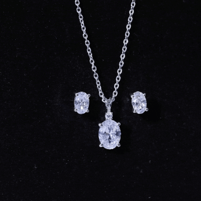 Oval Cut Cubic Zirconia Solitaire Necklace and Earrings in Silver