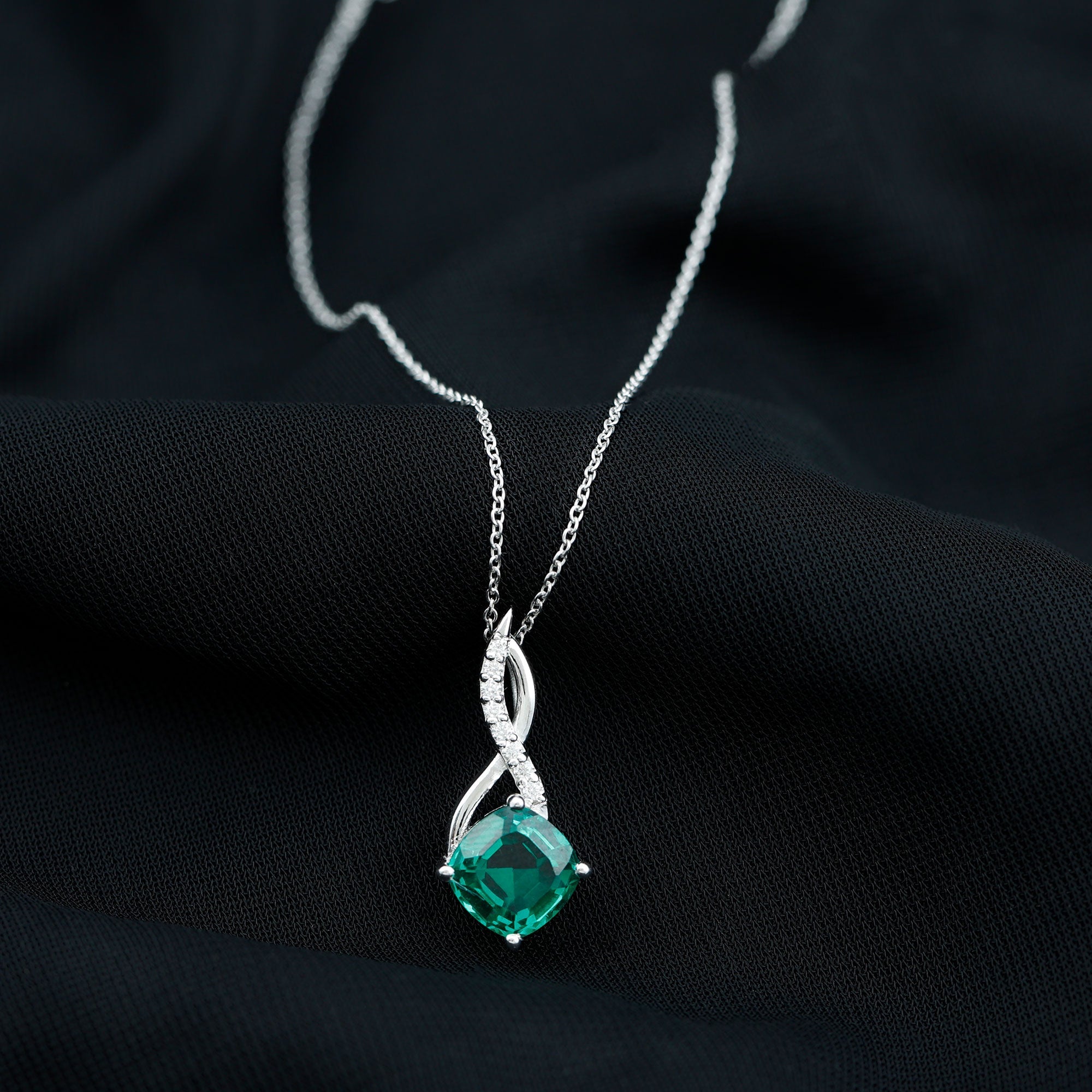 Emerald Infinity Necklace – Lab Created Emerald & Sparkling Moissanite Pendant