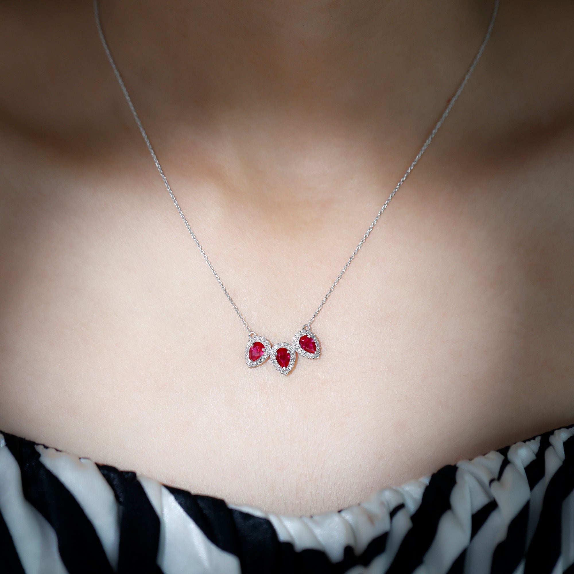 Lab Created Ruby Necklace – Three Stone Pear Cut Ruby with Moissanite Halo