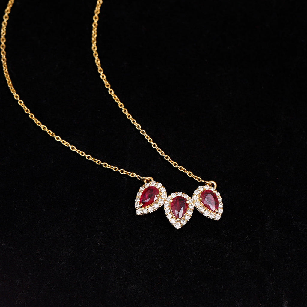 Lab Created Ruby Necklace – Three Stone Pear Cut Ruby with Moissanite Halo