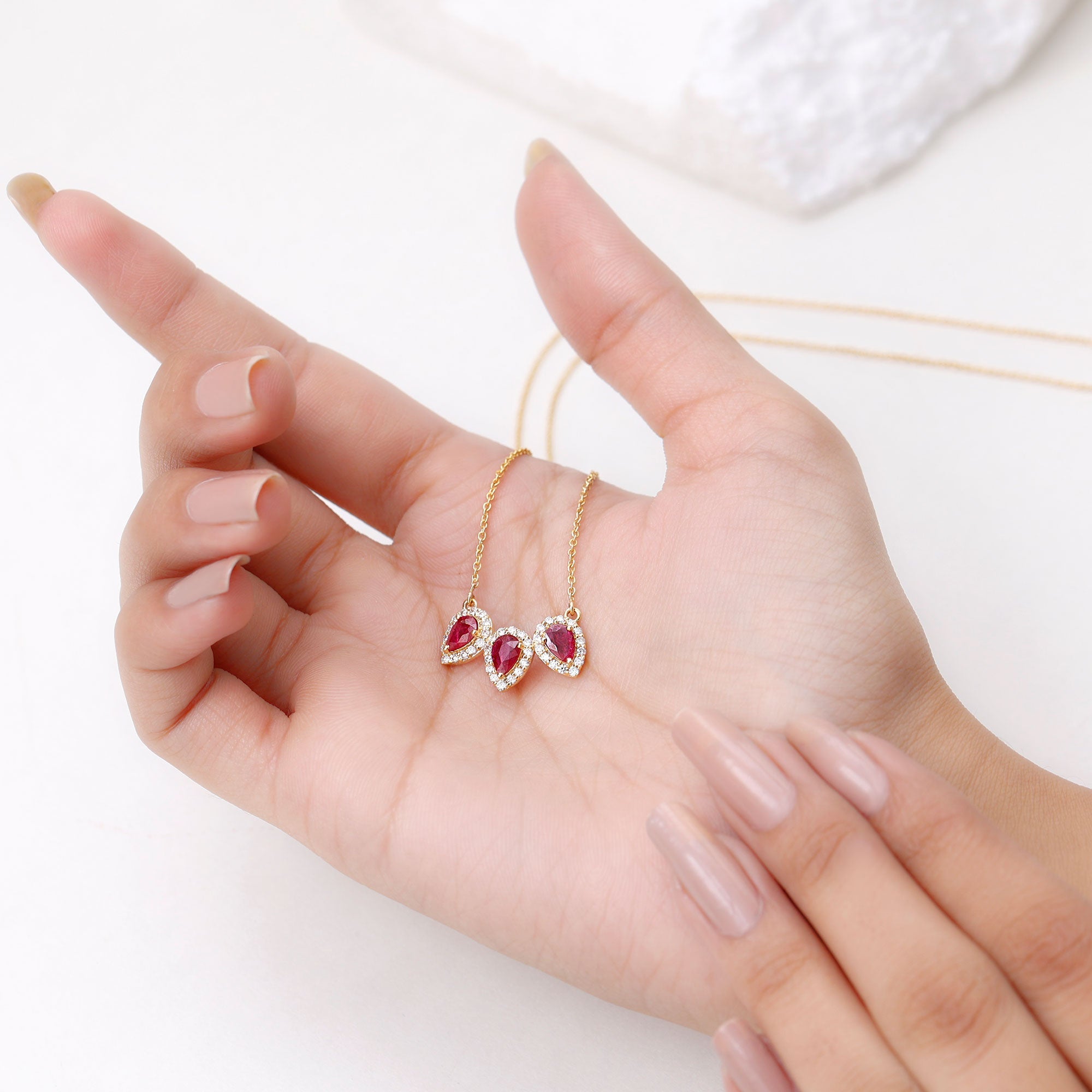 Lab Created Ruby Necklace – Three Stone Pear Cut Ruby with Moissanite Halo