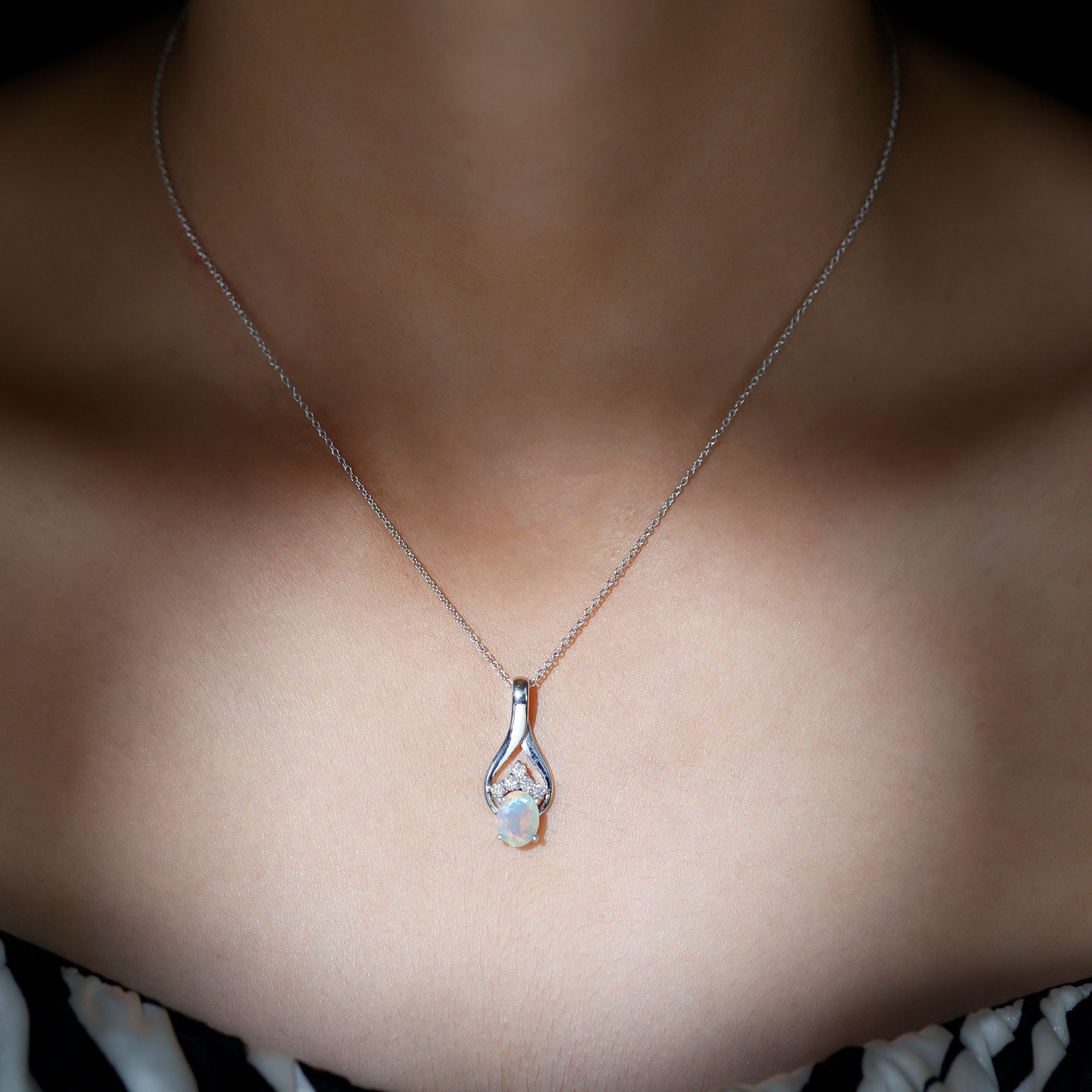 1.2 Carat Oval Ethiopian Opal Teardrop Pendant in Silver