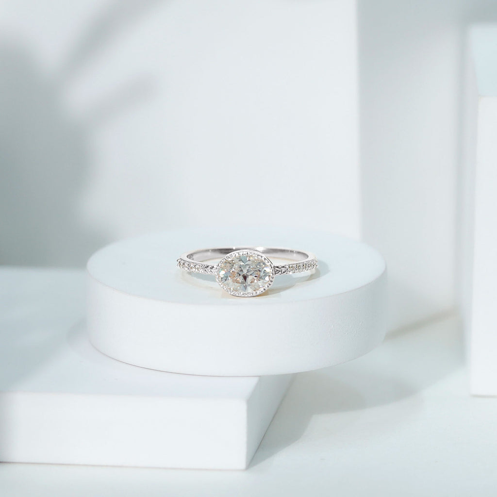 Moissanite Engagement Ring - Oval 1 Carat East West Style Bezel Setting