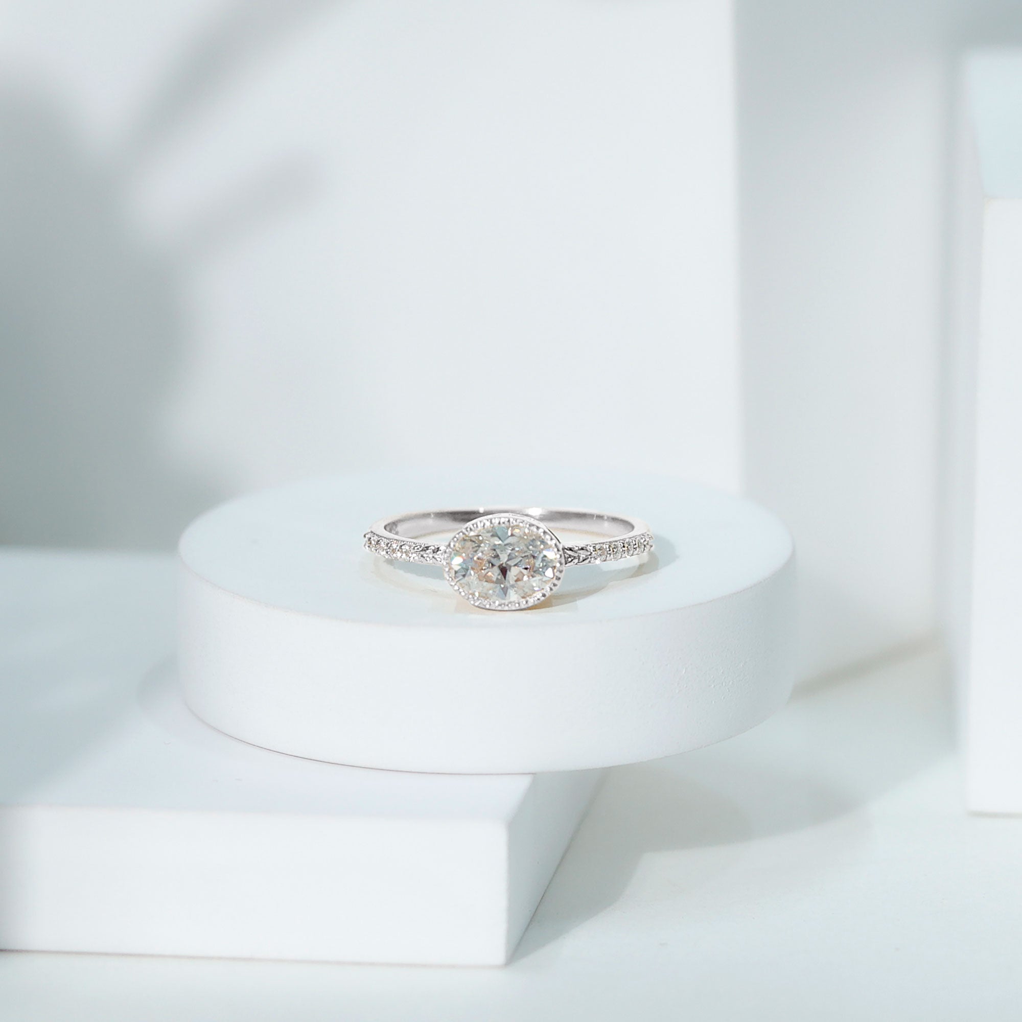 Moissanite Engagement Ring - Oval 1 Carat East West Style Bezel Setting