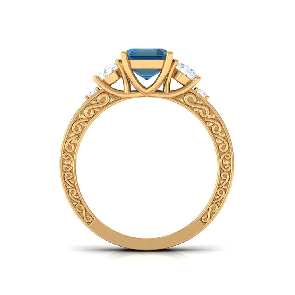 2.25 Carat Emerald Cut London Blue Topaz Statement Ring with Engraved Shank