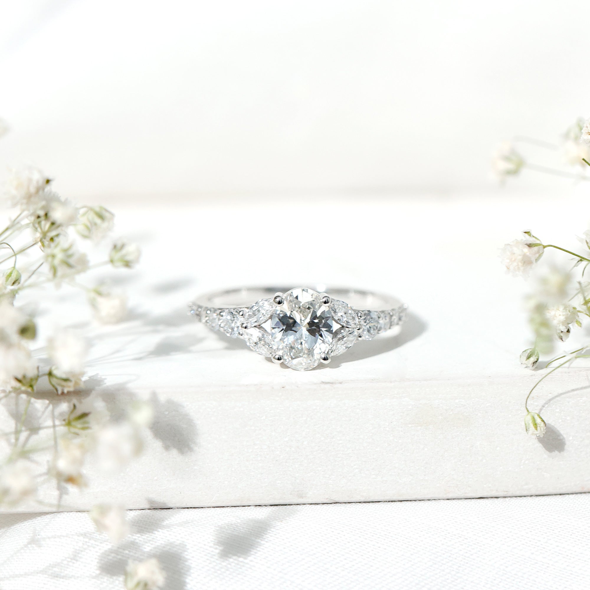Certified 1 Carat Oval Lab Grown Diamond Engagement Ring With Side Stones