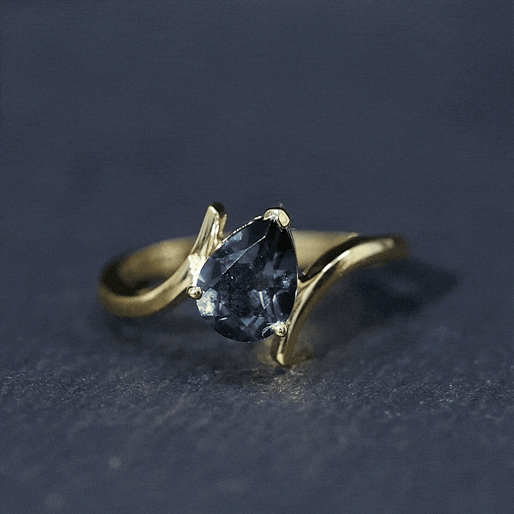 1 Carat Pear Shape London Blue Topaz Solitaire Ring with Bypass Shank
