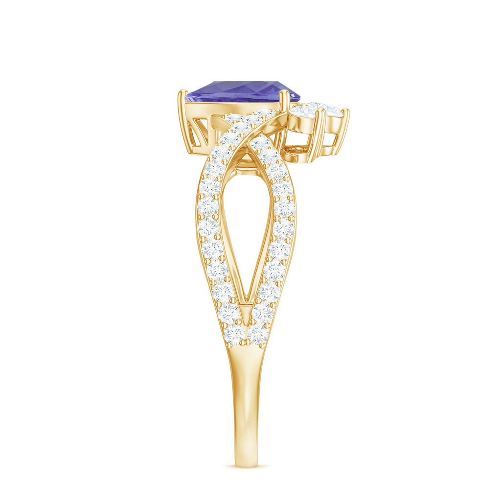 Tanzanite Engagement Ring – Pear Shape Tanzanite with Diamond Crossover Band