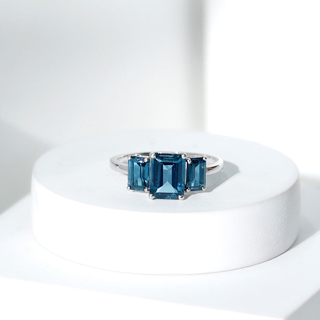 Emerald Cut London Blue Topaz Three Stone Engagement Ring