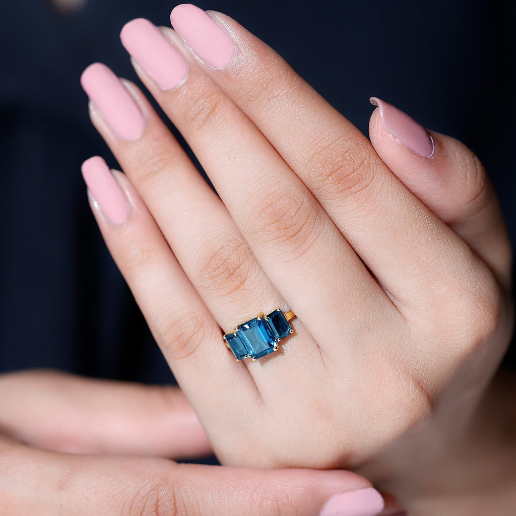 Emerald Cut London Blue Topaz Three Stone Engagement Ring