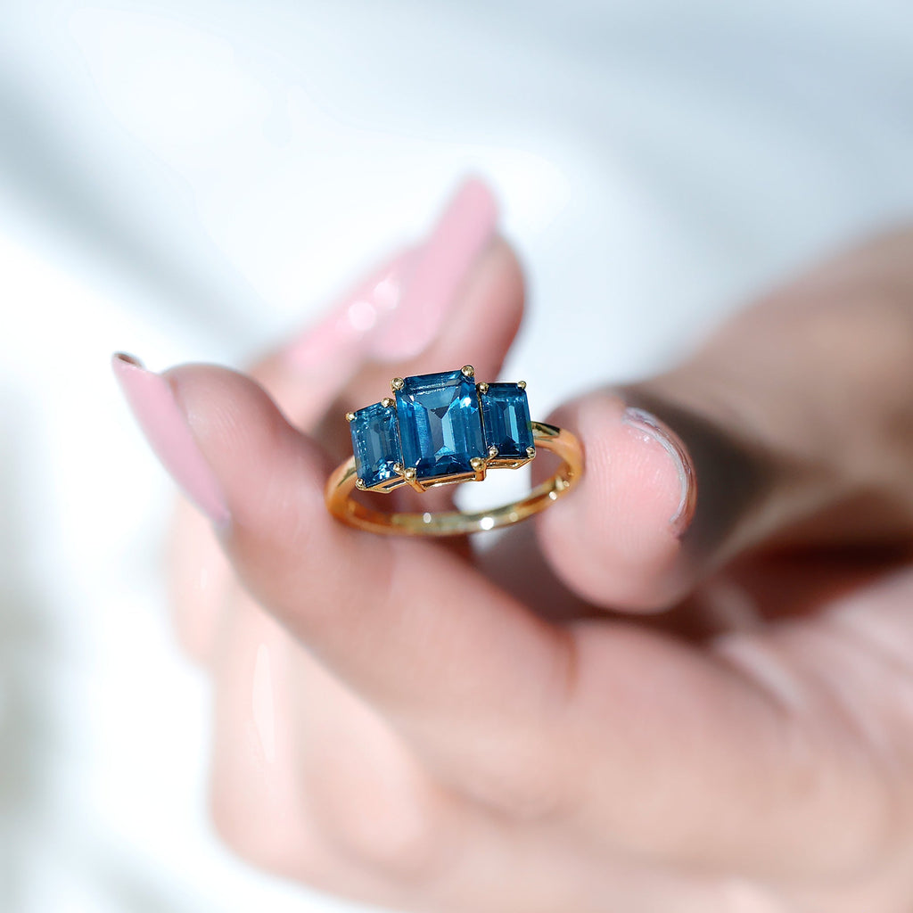 Emerald Cut London Blue Topaz Three Stone Engagement Ring