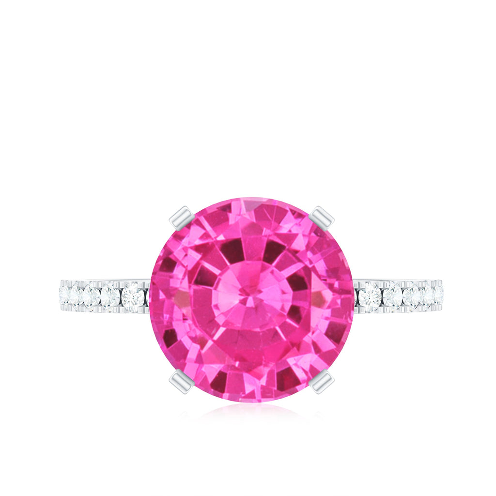 Round created pink sapphire solitaire engagement ring with diamond pavé band
