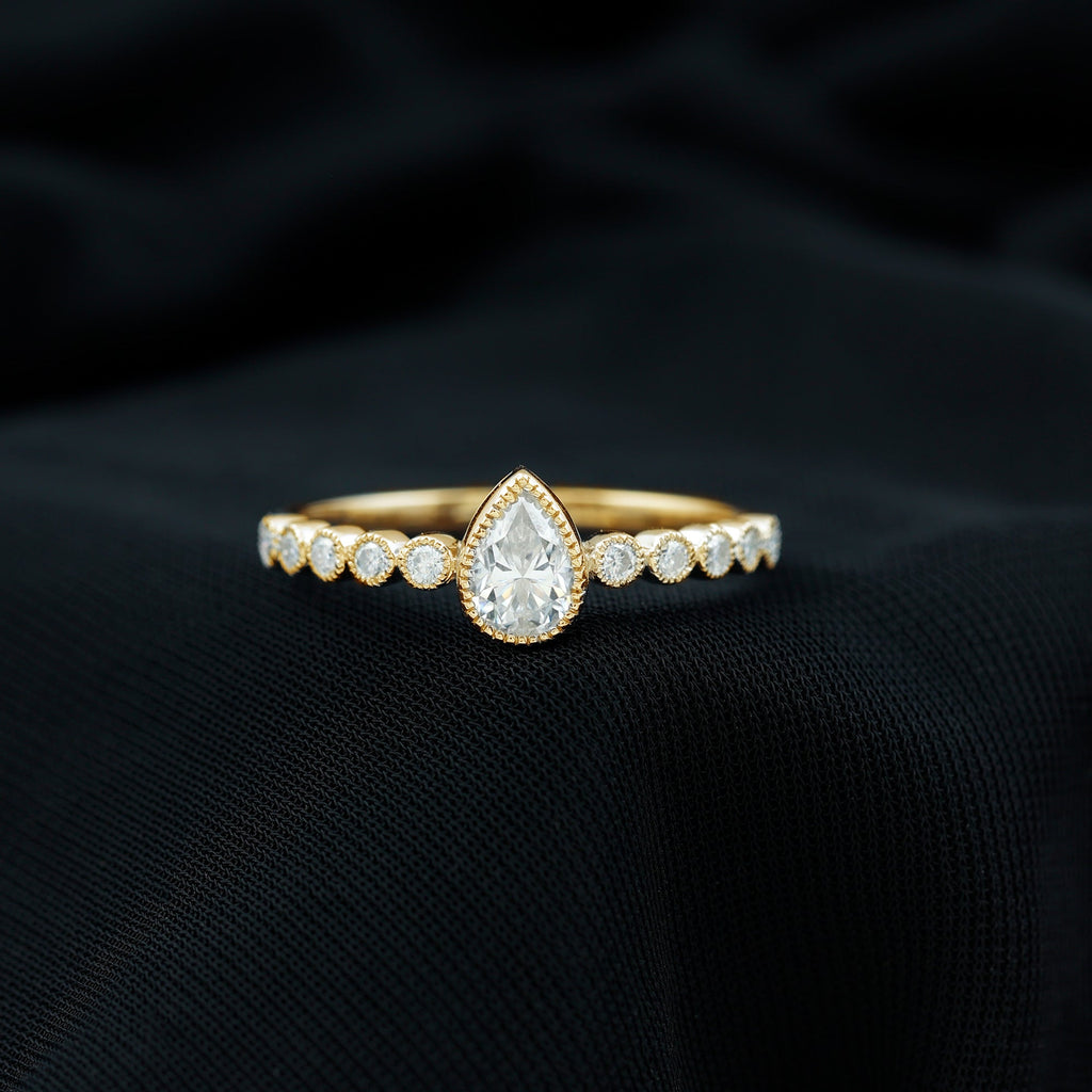 Lab Grown Diamond 0.6 Carat Pear Shaped Engagement Ring With Side Stones